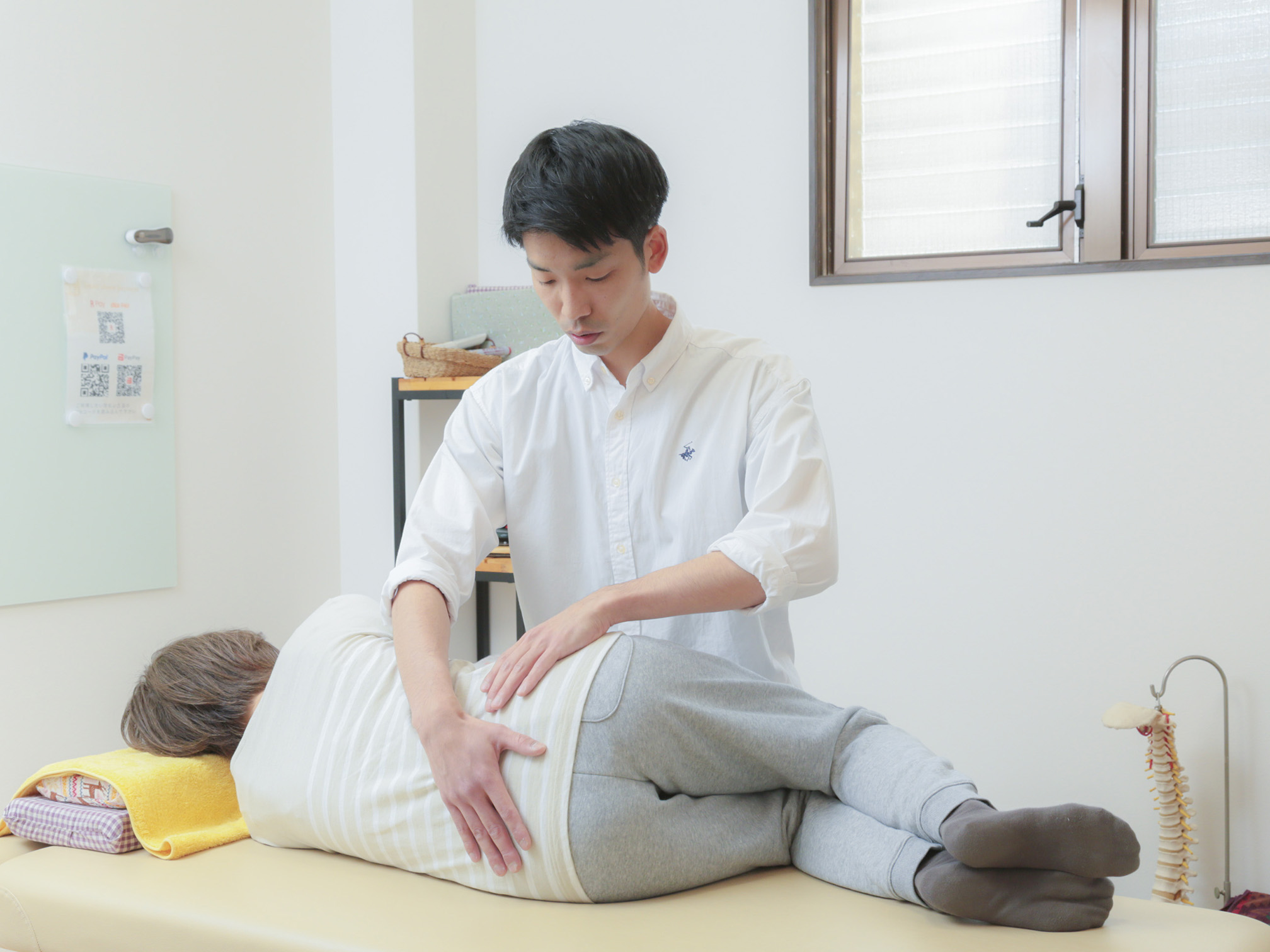梨状筋症候群・腰の施術シーン|京都オステオパシーセンターOQ